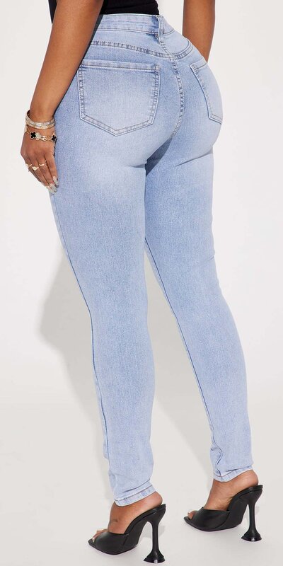 Úzke džínsy so stredne vysokým pásom Modrá