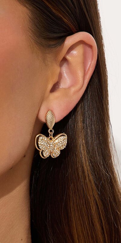 Zlaté visiace náušnice s motívom motýľa Zlatá
