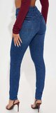 Tvarujúce tmavé skinny džínsy s elastickým efektom