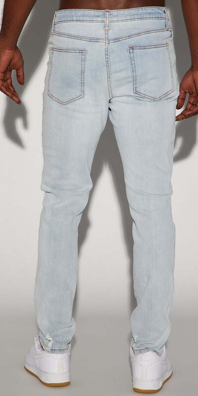 Pánske slim rifle s roztrhaným efektom v svetlom odtieni Modrá