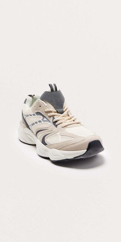 Krémovo sivé tenisky s robustnou podrážkou Šedá