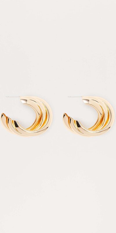 Elegantné kruhové náušnice s metalickým detailom Zlatá