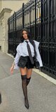 Dámska čierna koženková cargo mini skort