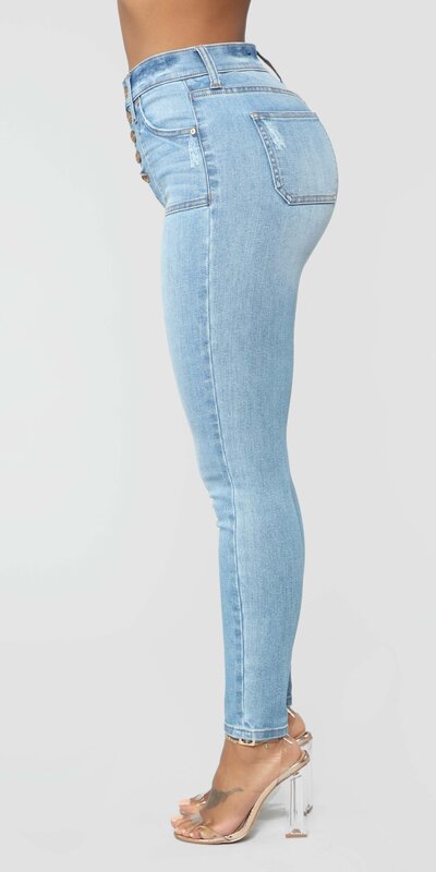 Vysoké skinny rifle v svetlomodrej farbe s gombíkovým zapínaním