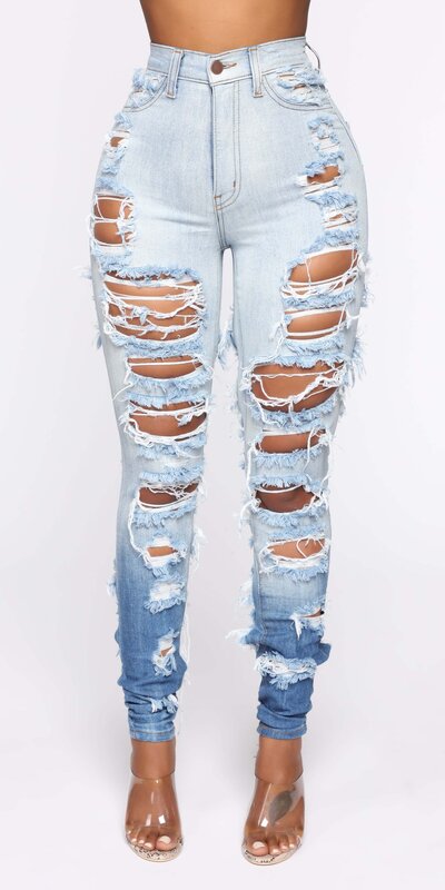 Modré skinny rifle s vysokým pásom a výrazne roztrhaným dizajnom