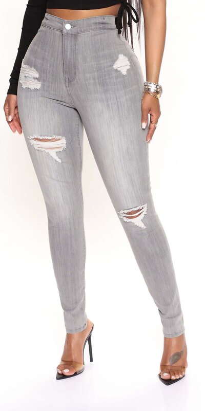 Šedé ultra vysoké skinny džínsy s kompresným efektom