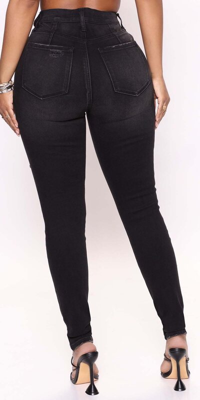 Čierne skinny džínsy s trhancami a tvarujúcim efektom