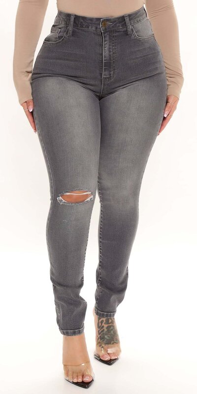Šedé skinny džínsy s trhancami a vysokým pásom