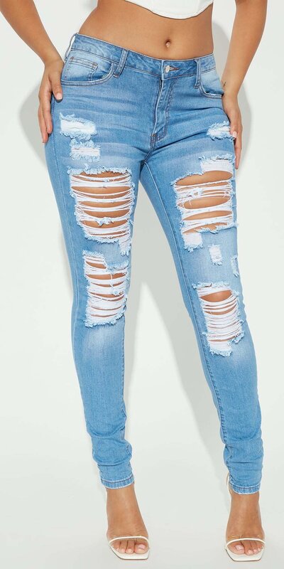 Bledomodré skinny džínsy s trhancami Tall