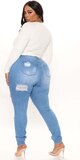 Bledomodré skinny džínsy s trhancami Tall