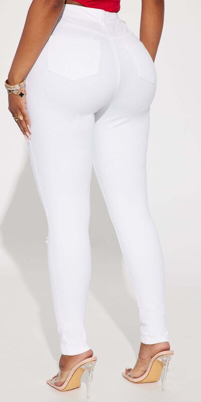 Biele roztrhané skinny džínsy s vysokým pásom