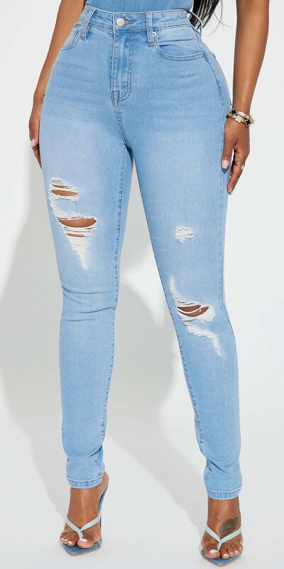 Svetlomodré roztrhané skinny džínsy s vysokým pásom