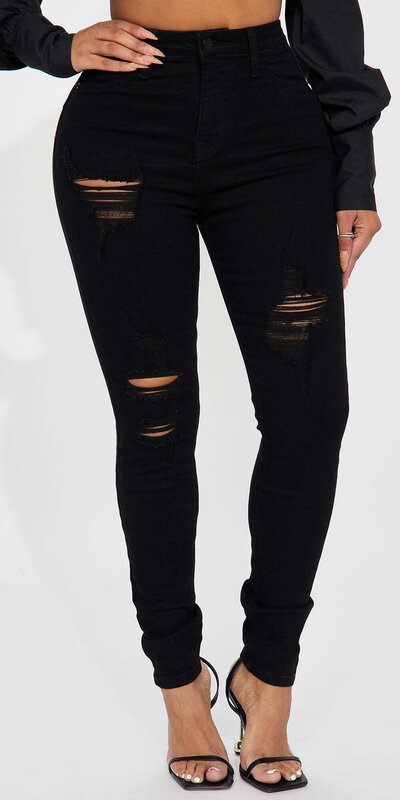 Čierne roztrhané skinny rifle s vysokým pásom