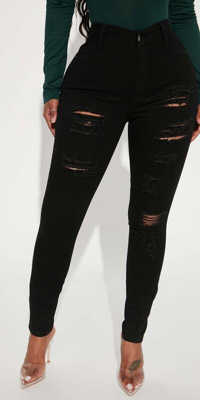 Čierne skinny rifle s roztrhanými detailmi