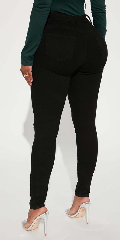 Čierne skinny rifle s roztrhanými detailmi