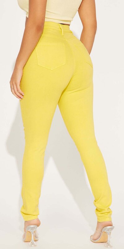 Žlté skinny rifle s vysokým pásom