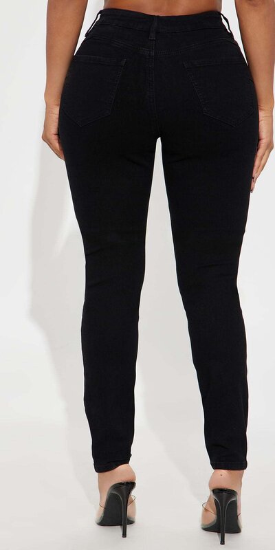 Čierne skinny rifle s predĺženým strihom