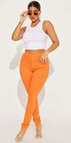 Oranžové skinny rifle s vysokým pásom
