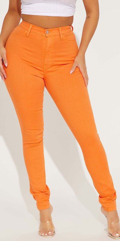 Oranžové skinny rifle s vysokým pásom