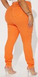 Oranžové skinny rifle s vysokým pásom