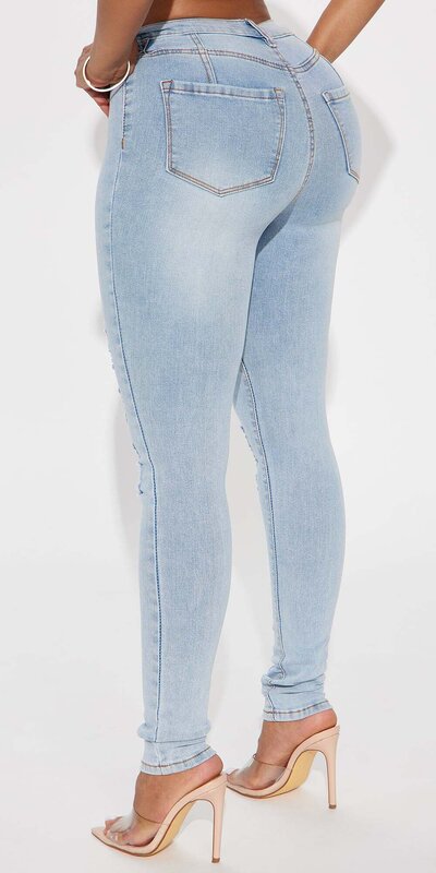 Svetlomodré skinny džínsy s push up efektom, vysokým pásom a roztrhaným dizajnom