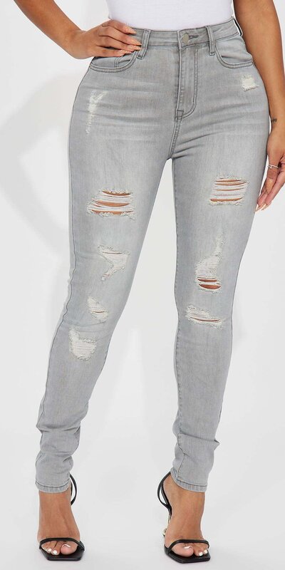 Šedé skinny džínsy s vysokým pásom a roztrhaným efektom