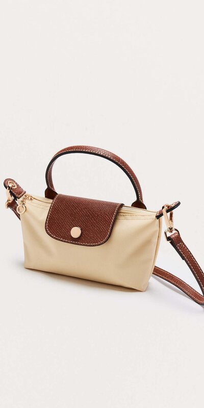 Béžová crossbody kabelka z umelej kože so zipsovým zapínaním