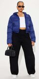 Luxusná tmavomodrá puffer bunda s kapucňou Tmavomodrá