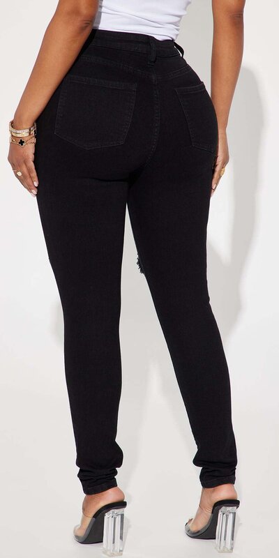 Roztrhané skinny rifle s vysokým pásom v čiernej farbe