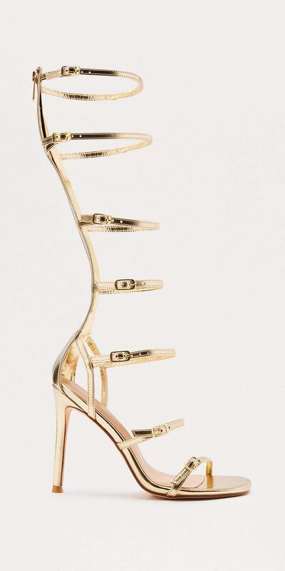 Zlaté sandále po kolená s prackami a vysokým podpätkom