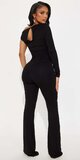 Čierny overal na jedno rameno s riasením a rozšírenými nohavicami