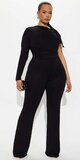 Čierny overal na jedno rameno s riasením a rozšírenými nohavicami
