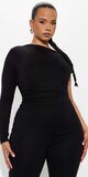 Čierny overal na jedno rameno s riasením a rozšírenými nohavicami
