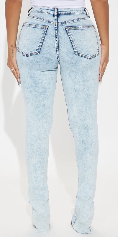 Svetlé acid rifľové bootcut džínsy s vysokým pásom a roztrhanými detailmi