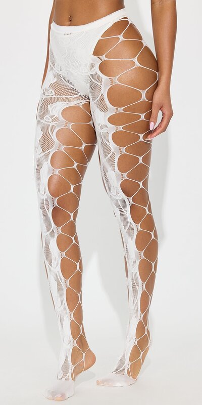 Biele pančuchy s jemným prestrihovaným vzorom