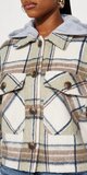Kockovaná shacket bunda v hnedom prevedení