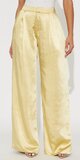 Saténové nohavice so širokými nohavicami v žltej farbe