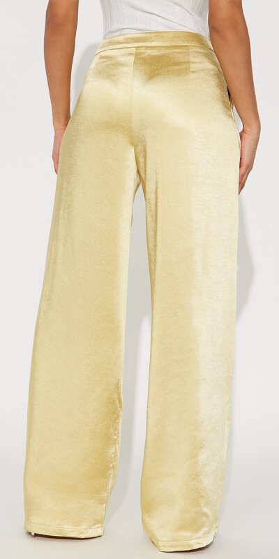 Saténové nohavice so širokými nohavicami v žltej farbe
