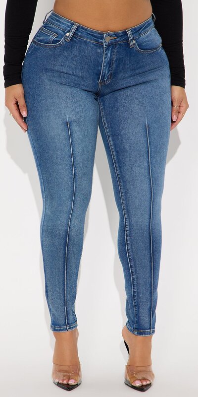 Skinny rifle s nízkym pásom a tvarujúcimi švami v modrej farbe