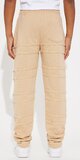 Teplákové nohavice s rovným strihom a strapkaným detailom v béžovej farbe