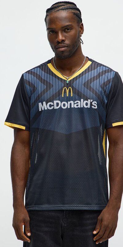 Voľné tričko s véčkovým výstrihom a športovou potlačou v čiernej farbe