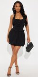 Halter mini šaty s mašľovým detailom a balónovým lemom v čiernej farbe