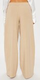 Elegantné nohavice so širokými nohavicami a vysokým pásom v béžovej farbe