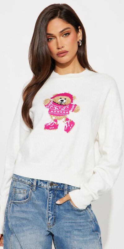 Skrátený sveter s grafickým motívom v krémovej farbe