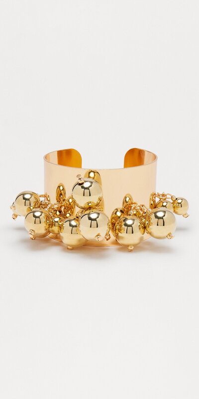 Otvorený náramok s guľôčkovými detailmi v zlatej farbe