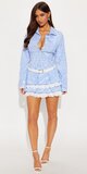 Pruhované košeľové mini šaty s volánovou sukňou v modrej farbe